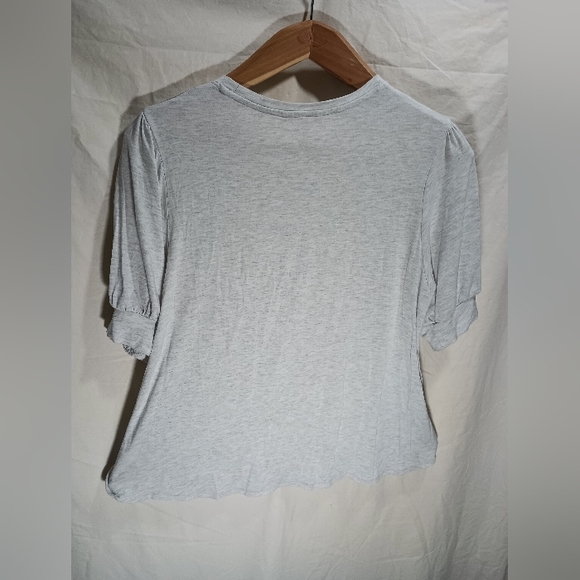 Parisian girl shopping with gems decorating the building. Size large. - Picture 6 of 8